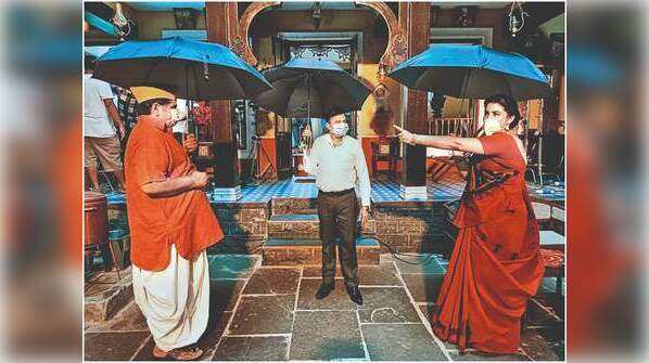 Social distance with an umbrella