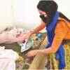 Ironing their own clothes
