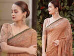 Surveen Chawla's beige and olive green sari is perfect for your 'Bhai ki shaadi'