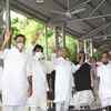 Congress leaders show victory sign, earlier at the CLP meet at CM Gehlot's residence.