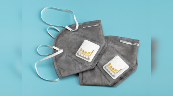 What is the function of an N-95 valved mask