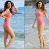 Flaunts her toned figure and washboard abs in a pink strapped swimsuit