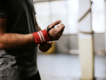 ​Wear gym gloves and arm sweatbands while working out