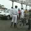 West Bengal: Police check commuters travelling during Covid-19 lockdown in Kolkata.