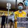 Hong Kong pro-democracy district councillors and activists protest outside the Hospital Authority headquarters against the government's decision to have inspectors from mainland China carry out Covid-19 tests in the city, fearing DNA data could be sent to the mainland
