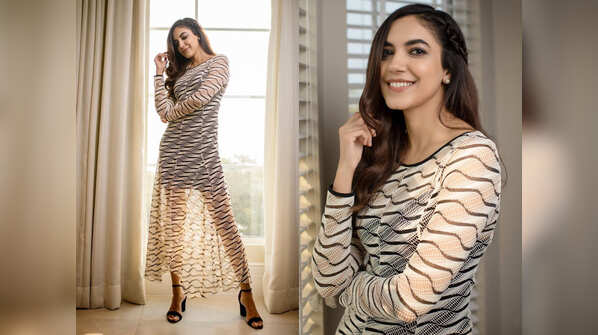 She looks absolutely stunning in the sequined two-piece bodycon outfit