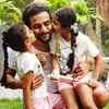 Srii Murali running with children