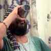 Sodhi drinking lassi