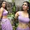 Nandini is a sight to behold in a purple saree with statement earrings