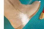 ​Apply talcum powder on liquid stains