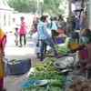 West Bengal: People gather at a market in Jagatdal of North 24 Parganas district despite lockdown in the state today.