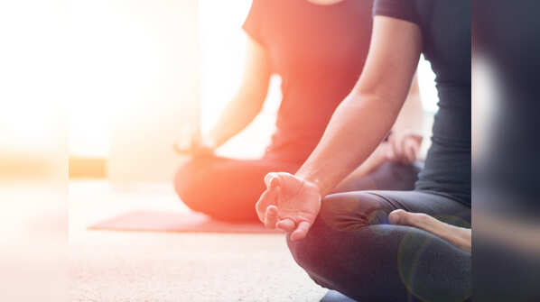 Practising breathing exercises and meditation