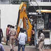 Article image for: Visakhapatnam: GVMC demolishes encroached <i class="tbold">portion</i> of ex-mayor’s house
