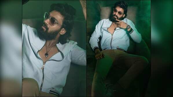 Sreenivas strikes a killer pose in a sweatshirt and tight pants