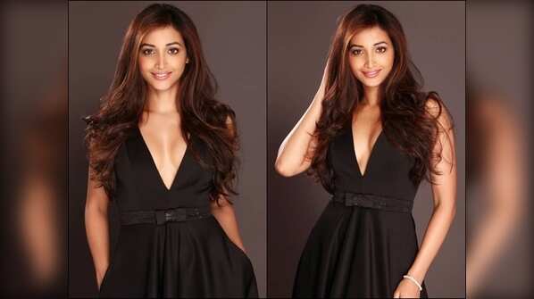 Srinidhi flaunts her toned figure in a black strapped jumpsuit
