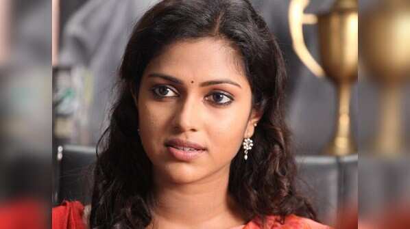A caring woman in 'Deiva Thirumagal'