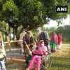 CRPF jawans help differently-abled & elderly voters at a booth in Chakarbandha area of Gaya