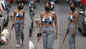 Malaika Arora looks simply amazing in this printed sports bra and jogging pants as she takes her furry friend Casper for a stroll