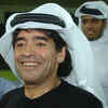Maradona wears traditional Arab headdress