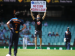 Protestor interrupts the match