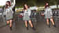 Elli AvrRam slays the airport look with grey T-shirt and black shorts