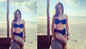 Kim Sharma slays in a black bikini, flaunts her curvaceous body