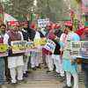 A group of SP workers staging demonstration after closing gate of collectorate in Varanasi