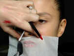 Set your lip colour with a tissue and powder