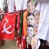 A CPM working purchasing a party flag to celebrate the LDF victory in Kozhikode