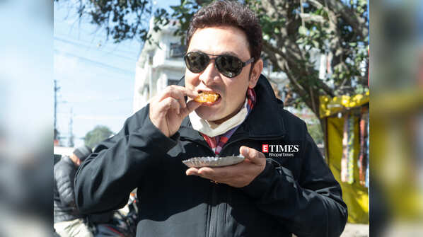 Trying out the famous Bhopali poha and jalebi