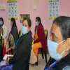 Beneficiaries wait inside observation room