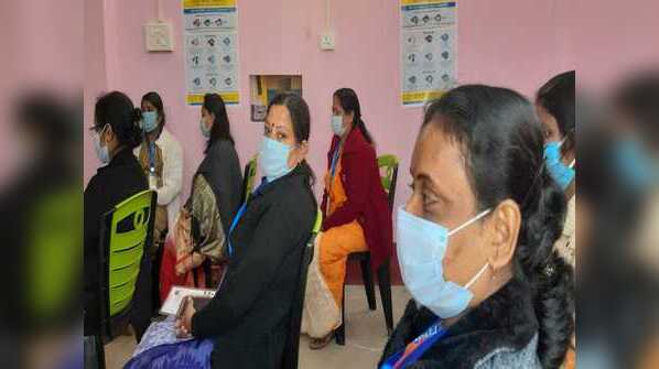 Beneficiaries wait inside observation room