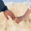Holding fingers and pulling hands