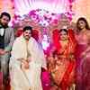 Mr. and Mrs. Banerjee posing with the guests