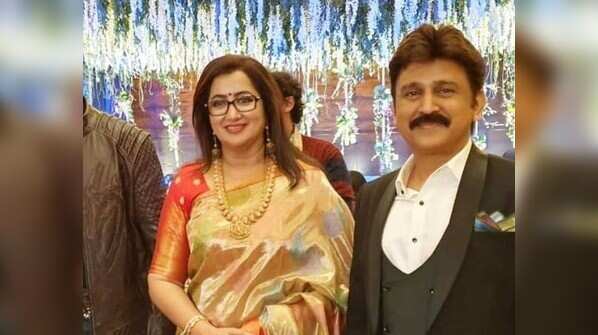 Sumalatha poses with Ramesh Aravind at the reception