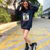 Article image for: Aditi Rao Hydari - Combat boots with dress T-shirt and shorts