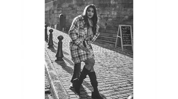 Pooja Hegde - Knee-length boots with a long coat and muffler