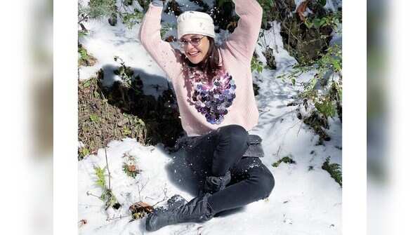 Kajal Aggarwal - Snow boots and bedazzled sweaters