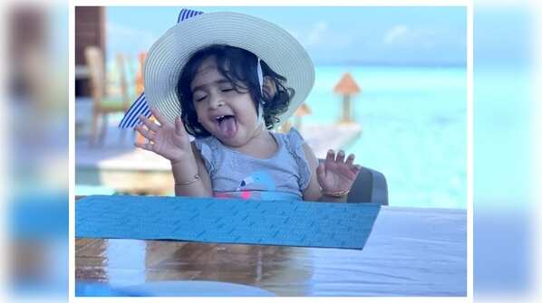 Baby Ayra charms everyone with her nonchalance