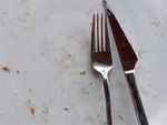 ​Putting dirty cutlery on the table