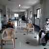 Senior citizens wait for vaccination at North Goa district  district hospital