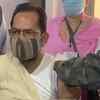 Union Minister of Minority Affairs Mukhtar Abbas Naqvi receives the first shot vaccine at Rampur, Uttar Pradesh