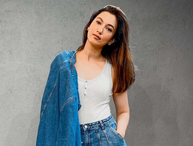 Booked for flouting COVID-19 rules after testing positive to being  manhandled in public; times when Gauahar Khan got mired in controversies |  The Times of India