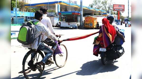Exodus of migrant workers from Gurugram to their native villages.