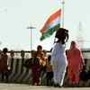 Migrant workers head home on the sixth day of national lockdown at Delhi Meerut express way in Delhi.