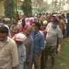 Assam: A long queue of voters at a polling centre in Rupahi, Nagaon district