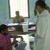 Congress leader Gaurav Gogoi casts his vote at a polling booth in Jorhat