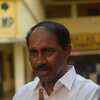 Tripunithura UDF candidate K Babu casts his vote