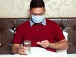 What should you do if you test negative but still show symptoms?