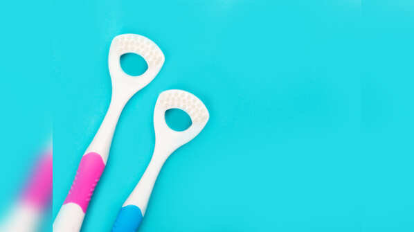 Disinfecting toothbrush and tongue cleaner